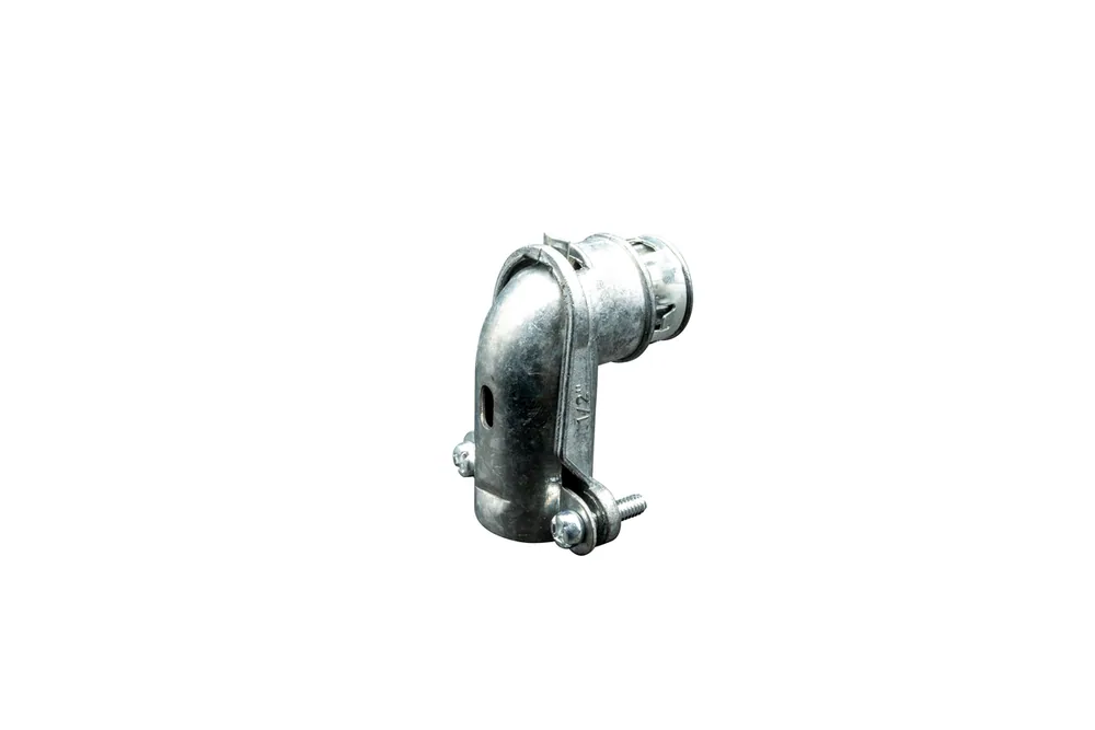 TAMAÑO 3/8" COMERCIAL CONECTOR MC TIPO SNAP 90 GRADOS ZINC COLADO A PRESIÓN TAMAÑO KO 1/2" RANGO DE CABLE: 0.445" - 0.610"